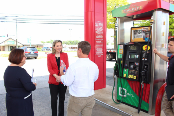 Comstock photo op in front of gas station